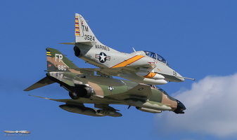 Skyhawk flying along the Phantom II